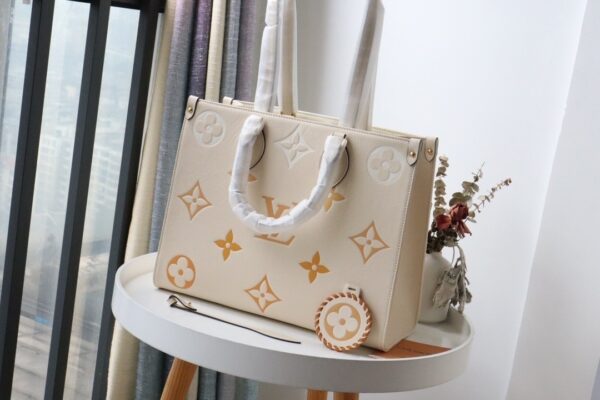 1:1 Replica Louis Vuitton LV OnTheGo MM Monogram Empreinte Cream Luxury Bag For Women M45717 - 13.8in/35cm