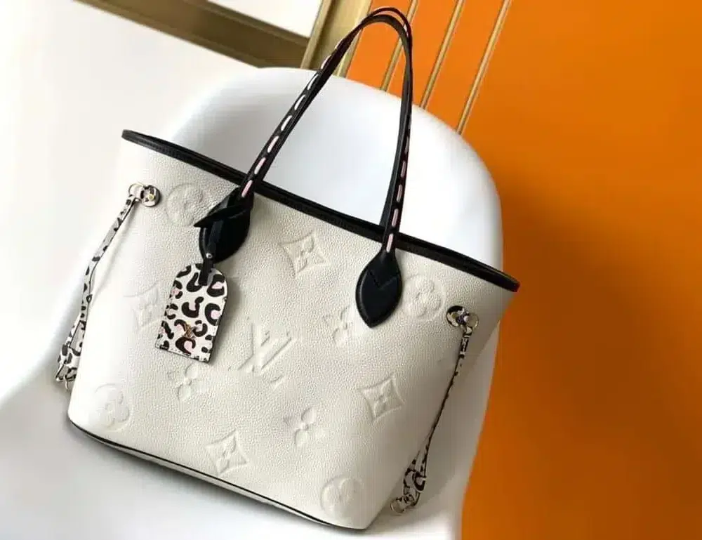 louis-vuitton-replica-neverfull-mm-wild-at-heart-monogram-empreinte-leather-m58525