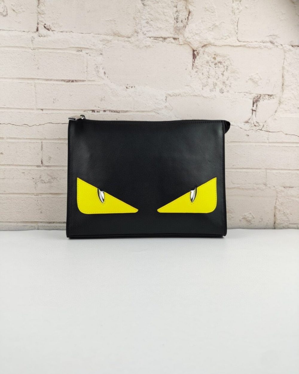 1:1 Replica Fendi Monster Eyes Flat Zip Pound Clutch in Black Yellow Eyes with Silver Hardware For Men 27cm/10.5in FF