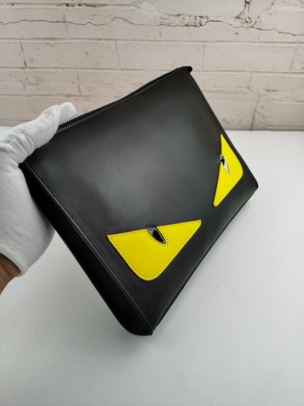 1:1 Replica Fendi Monster Eyes Flat Zip Pound Clutch in Black Yellow Eyes with Silver Hardware For Men 27cm/10.5in FF