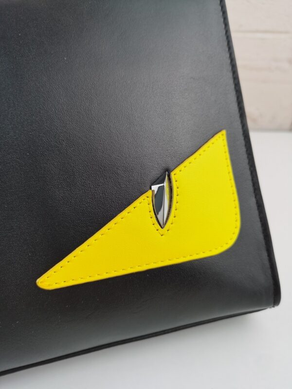 1:1 Replica Fendi Monster Eyes Flat Zip Pound Clutch in Black Yellow Eyes with Silver Hardware For Men 27cm/10.5in FF